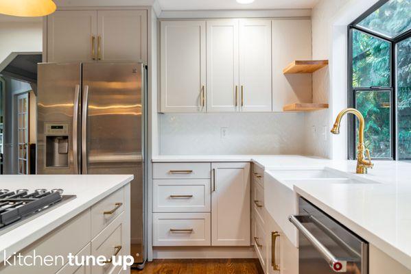 Timeless Elegance: Taupe Shaker Kitchen with Golden Accents