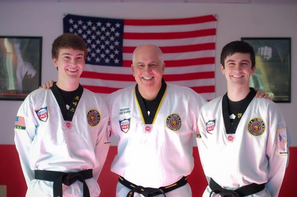 Master Kelly and 2 of his sons.