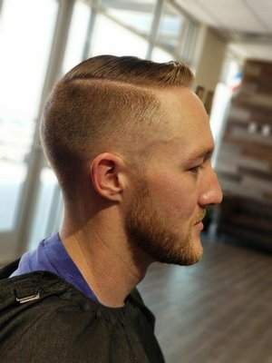 Low bald fade with hard part by TUI