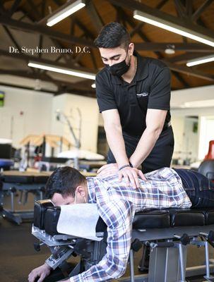 Dr. Bruno working on a patient in our Wall, NJ facility