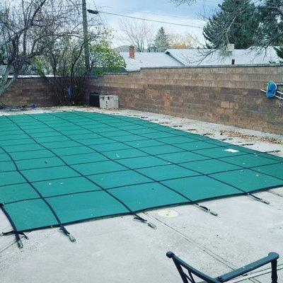 Winter pool cover installation