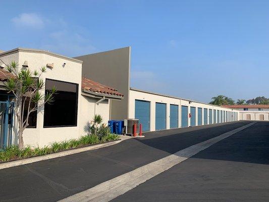 All drive-up storage units with roll-up doors and high ceilings.