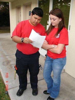 EMS Instructors Wesley and Tina Grading Practical Skills