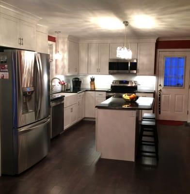 Water damaged kitchen after restoration.