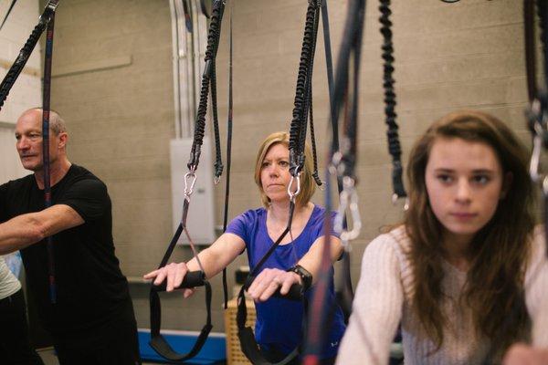 Pilates and Suspension Classes add a third dimension for training postural strength and balance.