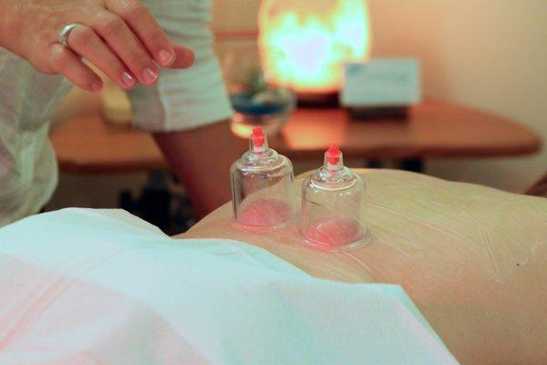 Cupping promotes circulation to relax and decongest (detox) the muscles.  It feels amazing like a great massage.