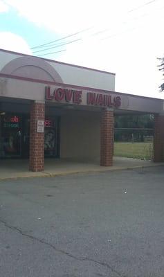 Exterior shot of Love Nails salon in Harvey.