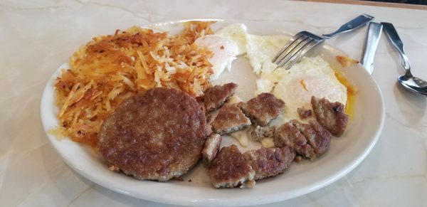 Basic 2 eggs, hash browns, plus sausage patty breakfast....comes w/ 2 pancakes