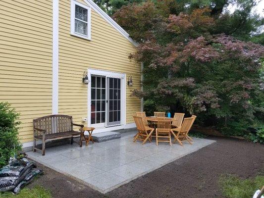 Patio in the backyard In chestnut hill mass