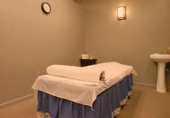 warm cozy single massage room