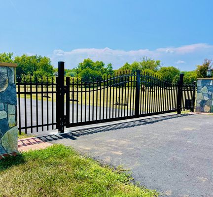 Aluminum automatic double  swing gate. We utilize top 10 best automatic gate openers systems. Solar powered, heavy-duty openers.