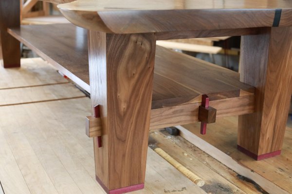 Japanese joinery on a custom coffee table using purple heart accents