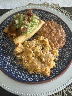 Chicken Flautas, Spanish rice, beans & guacamole