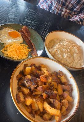 Biscuits & gravy. Potatoes. Fried egg, bacon.