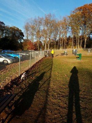 Facing the double chambered fence entrance on the small dog side