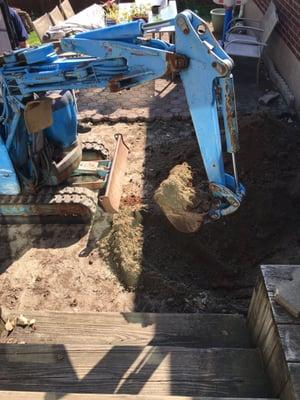 The tank ran below the steps and under the extension. It had to be cut for removal. Steps undamaged!!!