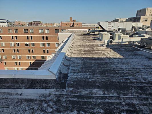 This commercial roof is at the point where it needs critical upkeep, including recoating.