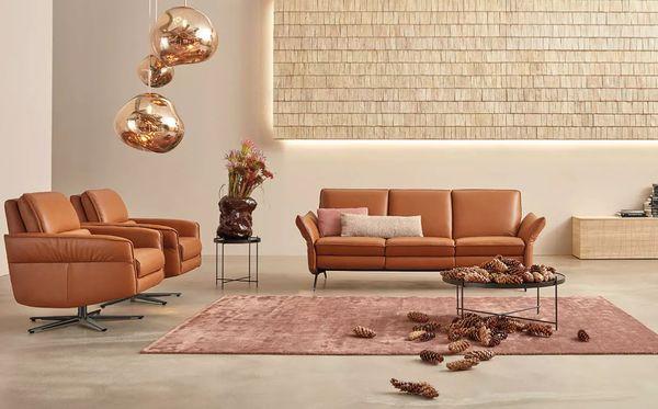 Himolla Siegfried sofa and reclining Himolla Aura chairs. (Ask about it's hidden headrest feature!)