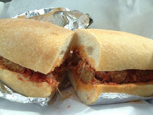 Meatball hoagie with mozzarella. "Real", tender meatballs.