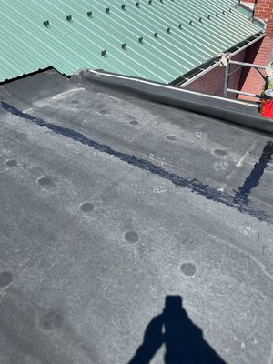 Patched a roof that had a small leak