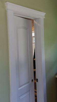 Simple doorway pediment

Private residence Sayville NY