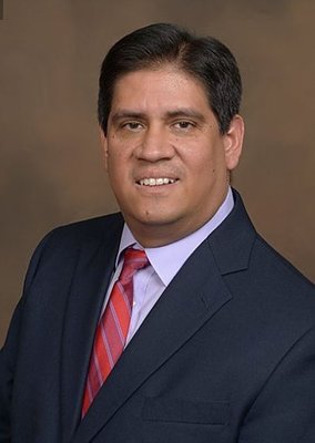 Dr. Carlos Ramirez