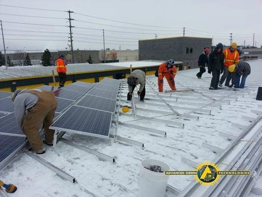 AGT Solar working hard over the winter in Ontario, Canada under the OPA Feed in Tariff Program.