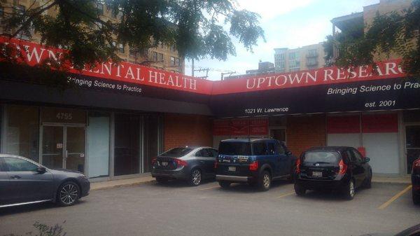 Uptown Research expanding....shows the new awning in this photo.