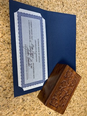 Carved box and remembrance certificate.