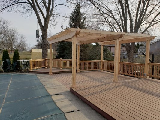 Another glimpse of our custom woodwork with this handmade pergola constructed last spring.