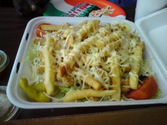 crispy chicken salad with fries and cheese