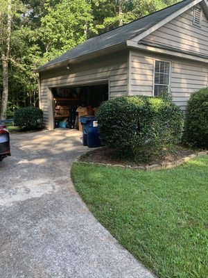 Freshly edged lawn and trimmed bushes