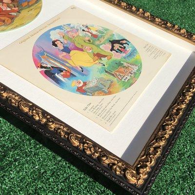 Antique Snow White record mount floated on fabric and shadowboxed