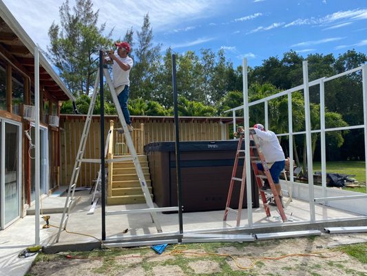 Patio screens framing pool