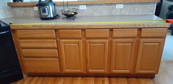 Tape measured cabinet area sent to Milestone David Gerdes. (see another photo of closeup of tape measure)