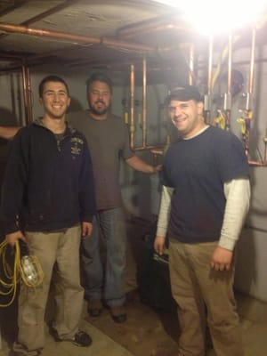 Dan, Jeff and Vic installing a boiler