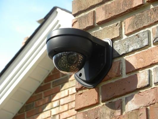 CCTV dome camera mounted on an "L" bracket