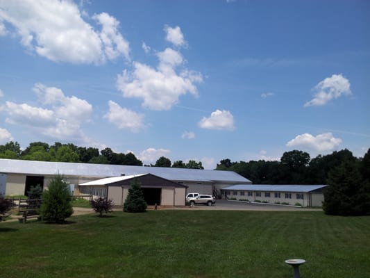 The indoor arena and stables