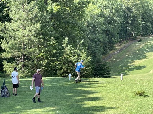 Beautiful people playing disc golf at Raptors Roost!