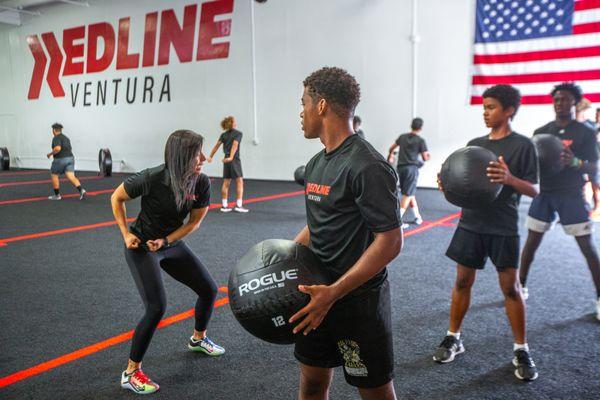 Youth athletics training on the main floor of Redline Athletics Ventura