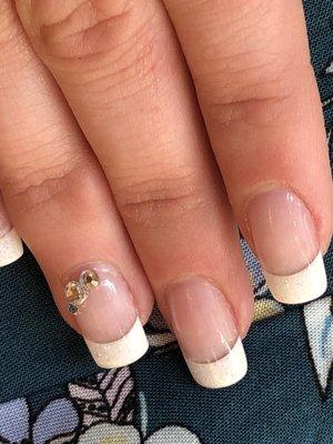 Prom nails! Acrylic dip with white glitter tips.