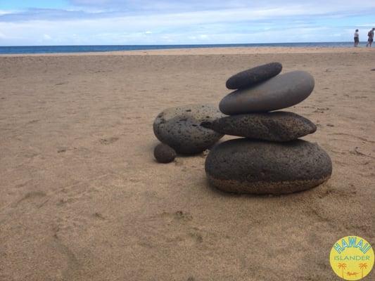 stacked rocks on the remote Hanakapiai Beach on Kauai ... 100% worth the viewing effort