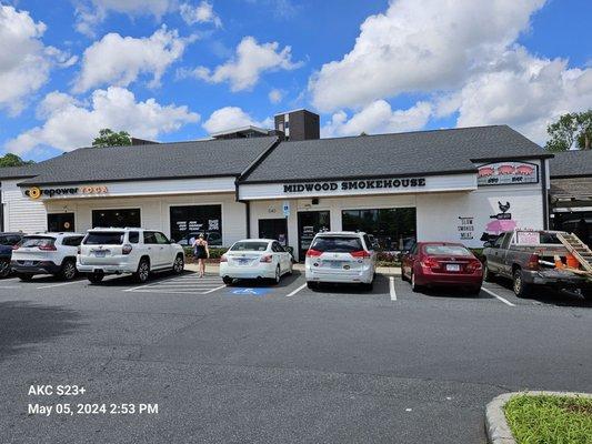 In nicely laid out shopping strip. Near garden center, Ace hardware, fitness studios: yoga,dance. Pack it on,take it off.