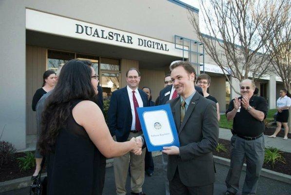 Receiving an award from the California State Assembly.