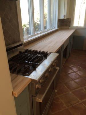 Butcher block kitchen countertop.