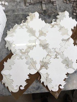 Waterjet tile