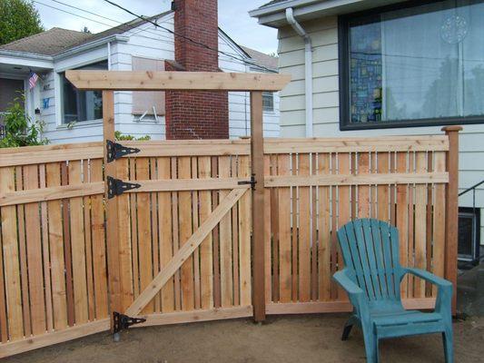 3 rail custom style in Seattle with simple garden trellis.