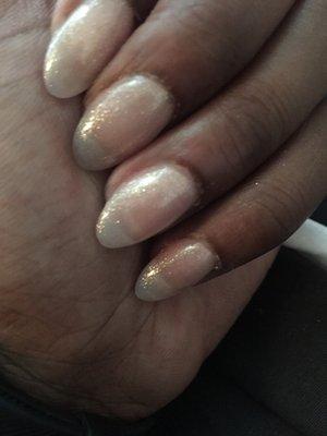 Simple and short almond nails with gel polish. No lumps or bumps.