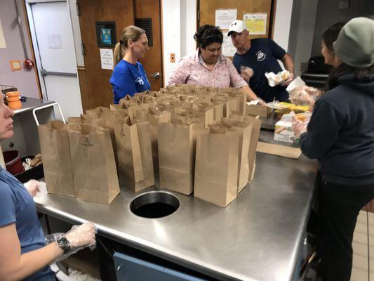 Making lunches to give out