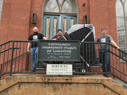 Delivering a grand piano to a church.